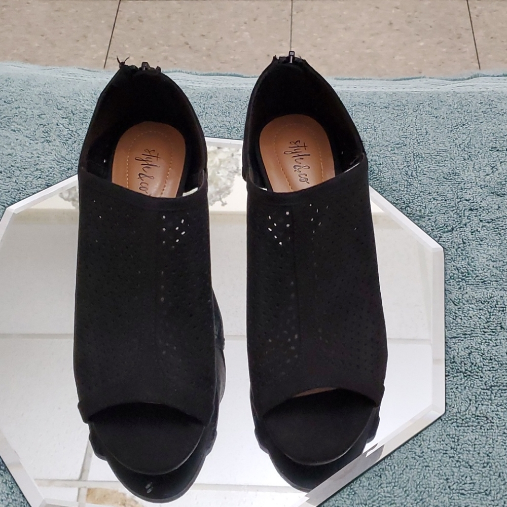 black shoes with openwork design